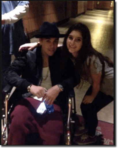 Justin Bieber playing poker in a wheelchair